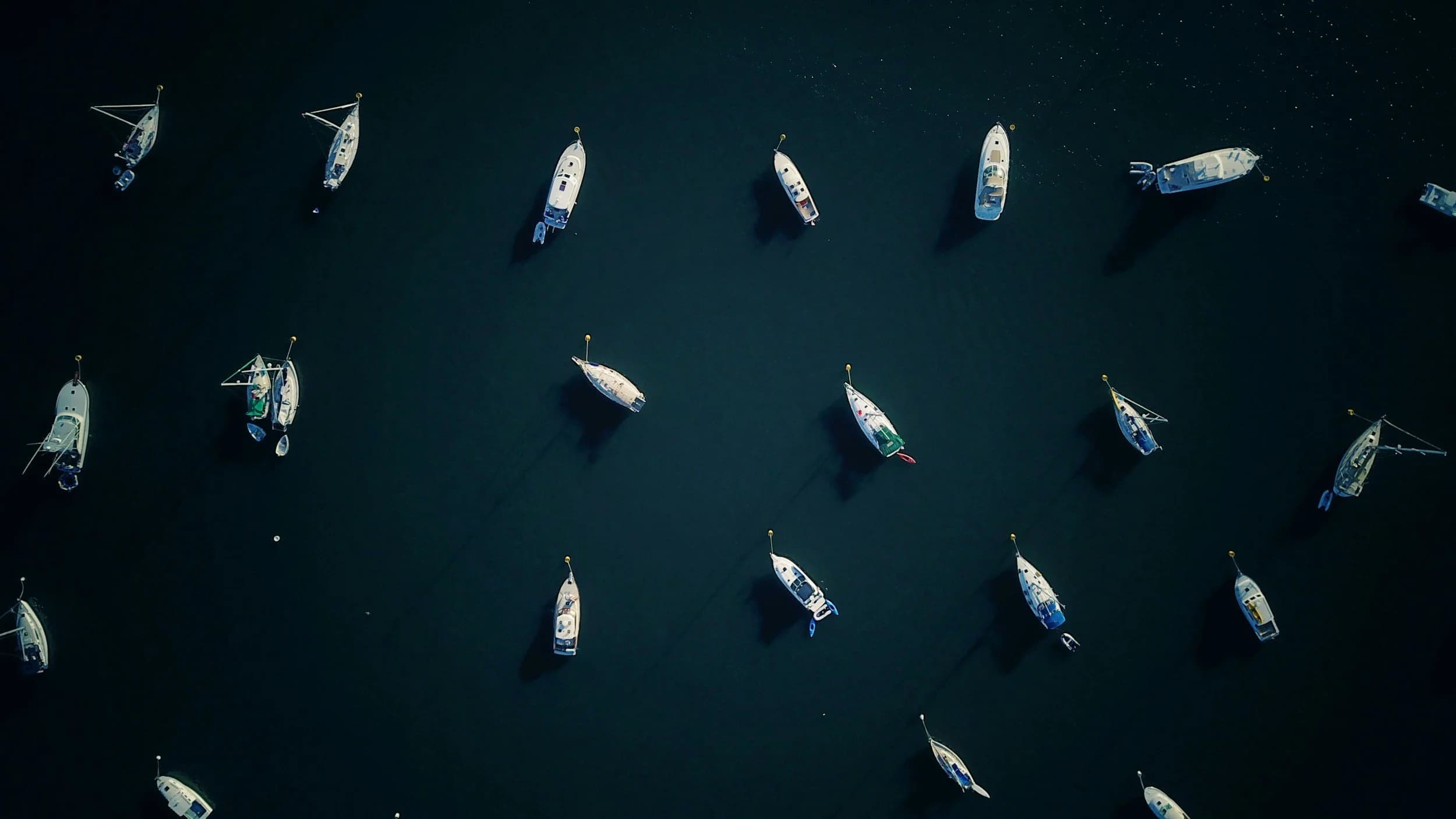 Aerial view of a sailboat off the New England coast